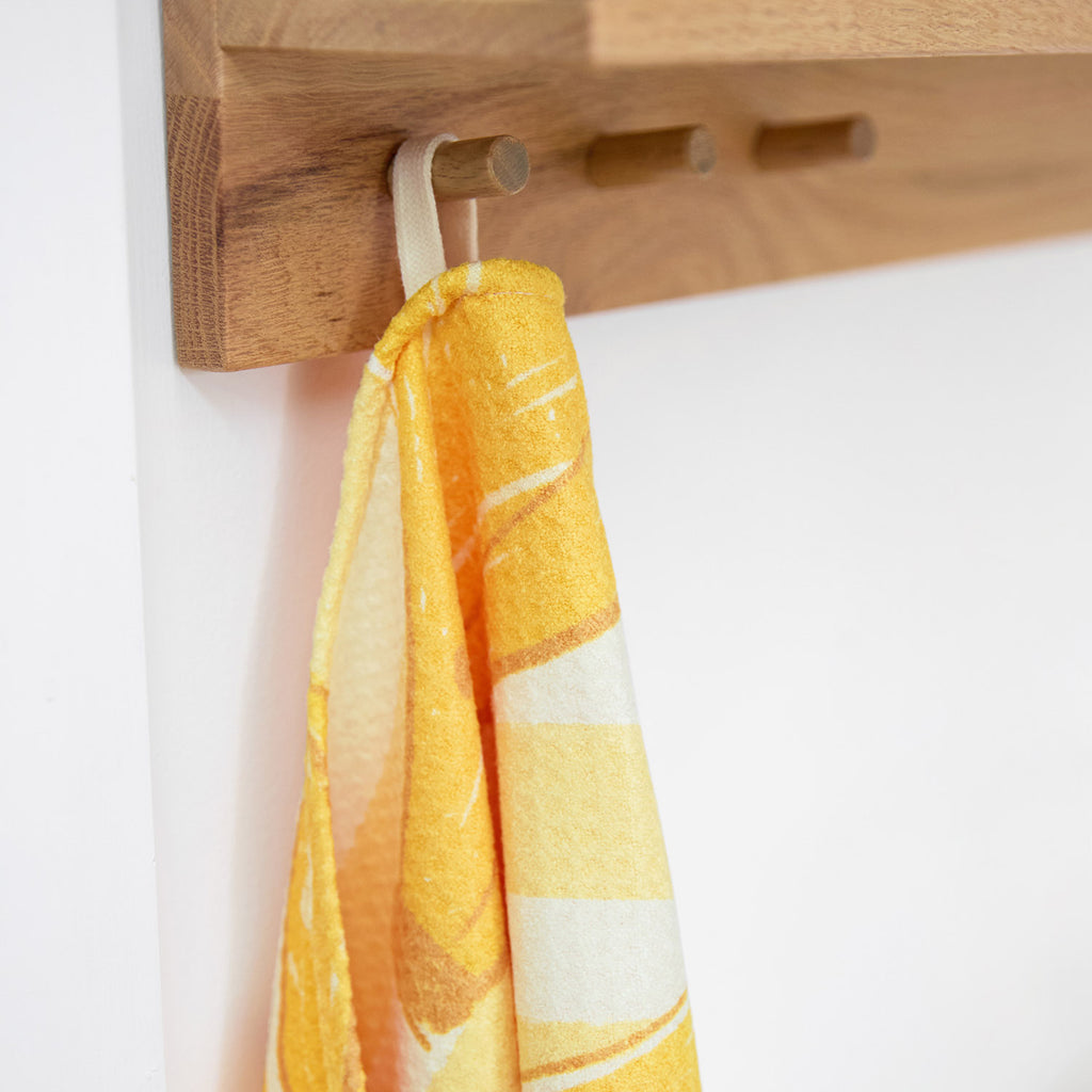 dock and bay tea towel